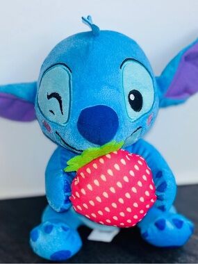 Disney Blue Stitch Plush Holding Pink Strawberry